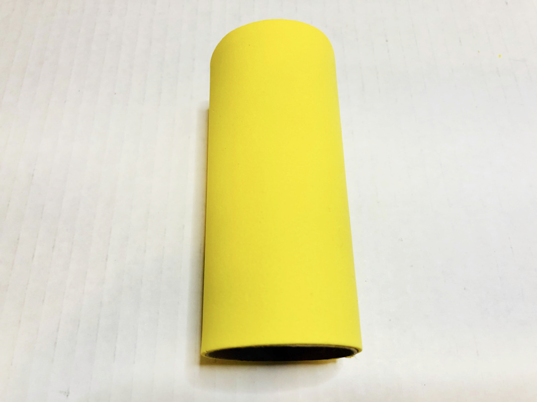 yellow toilet paper roll