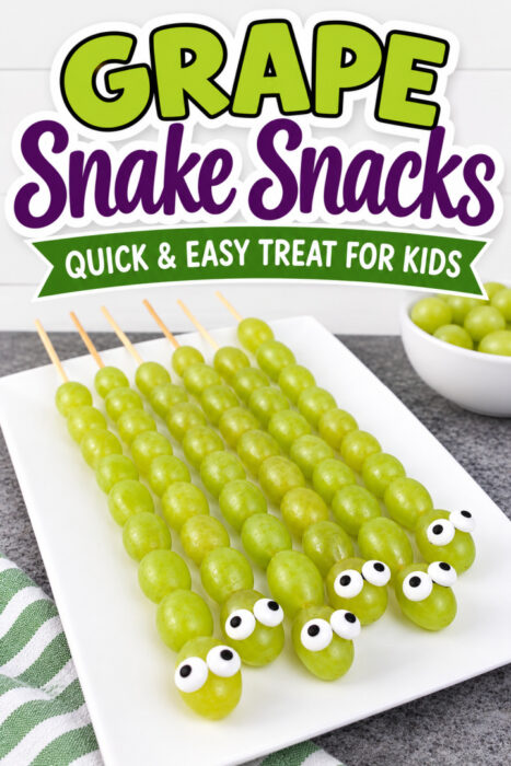 Grape snake snacks made with green grapes threaded onto skewers and topped with candy eyes for a fun and easy kids snack.