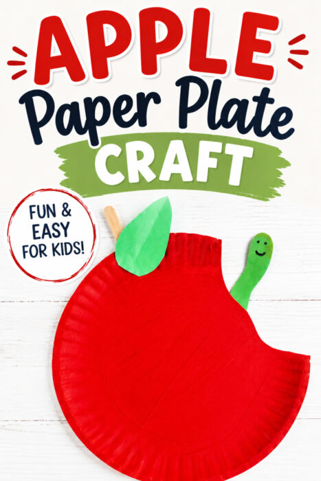 Apple paper plate craft for kids with a green leaf, craft stick stem, and caterpillar peeking out of the bite
